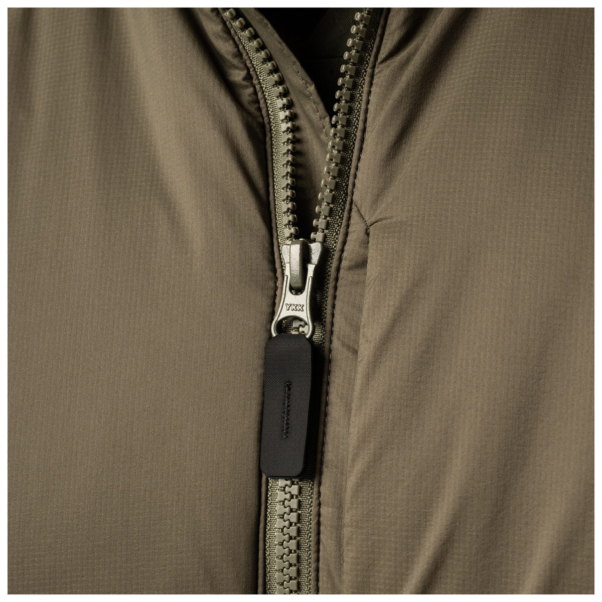5.11 V.XI XTU LT3 Jacket i Storm, med quiltad isolering och dragkedjefickor.
