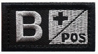 B + Pos - Svart - Silver - Patch