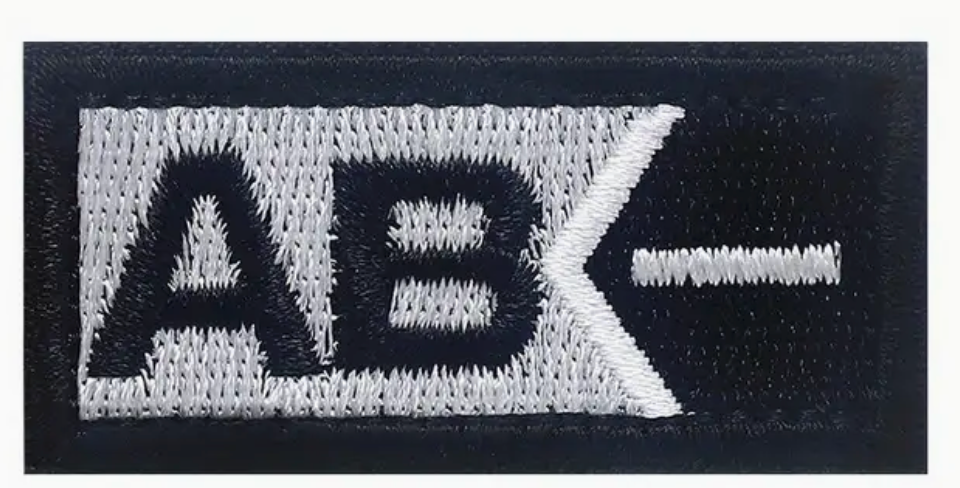 AB - Neg - Svart- Silver  - Patch