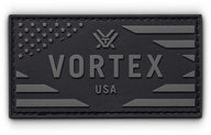Vortex Flagga Patch – kardborrepatch med Vortex-logga och flaggdesign