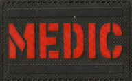 Medic tygmärke svart och röd